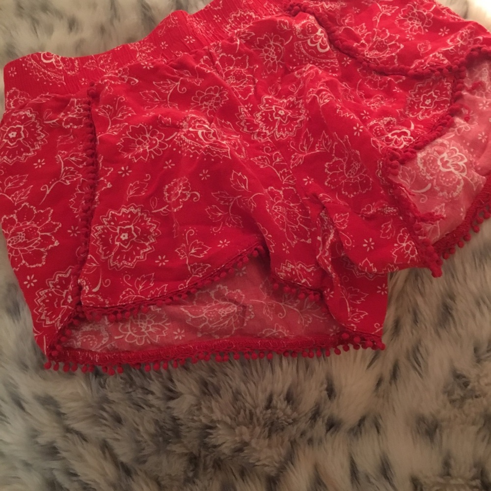 Floral Print With Pom Poms at the bottom